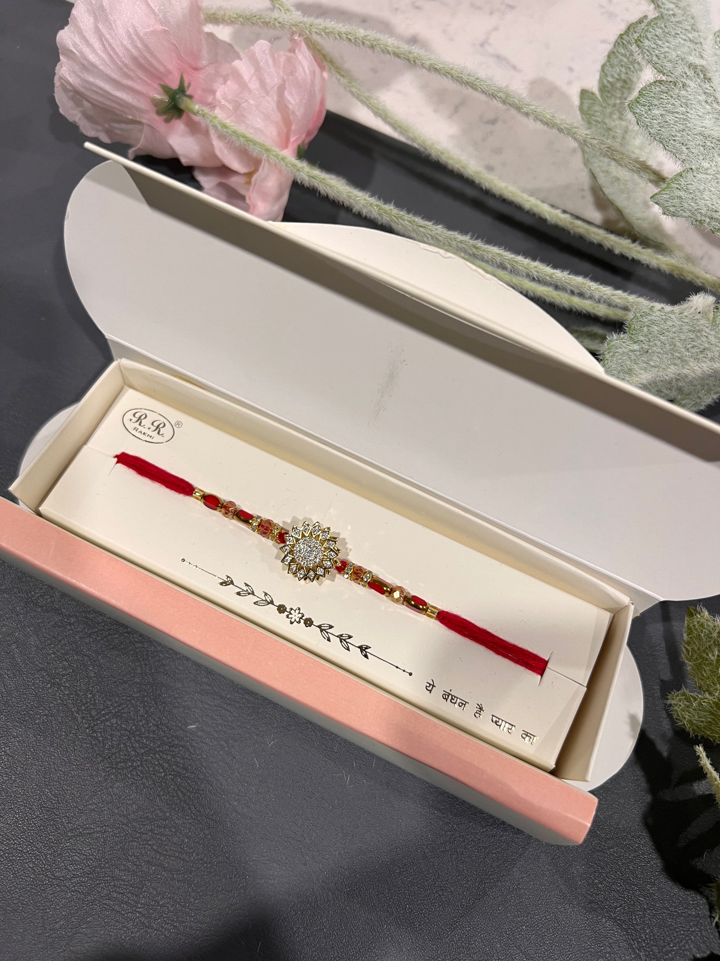 American diamond spinning Rakhi
