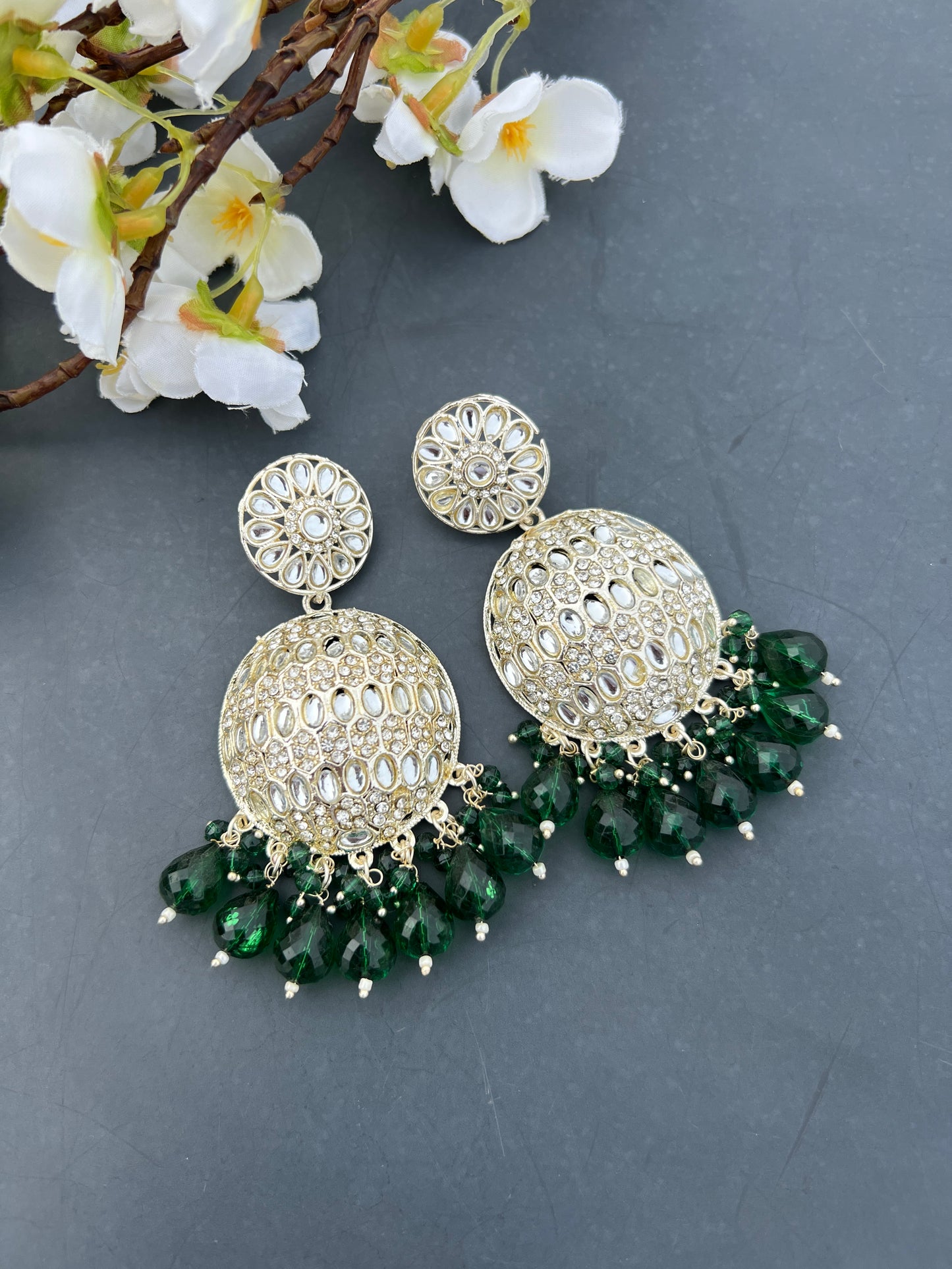 Green kundan earrings