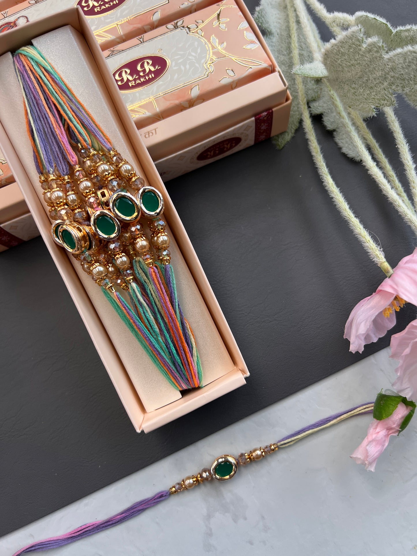 Kundan & Pearl Loaded Rakhi /
Rakhdi Thread ( Per PC)