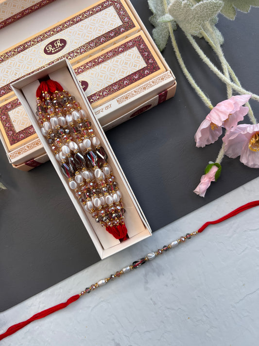Crystal & Pearl Loaded Rakhi /
Rakhdi Thread ( Per PC)