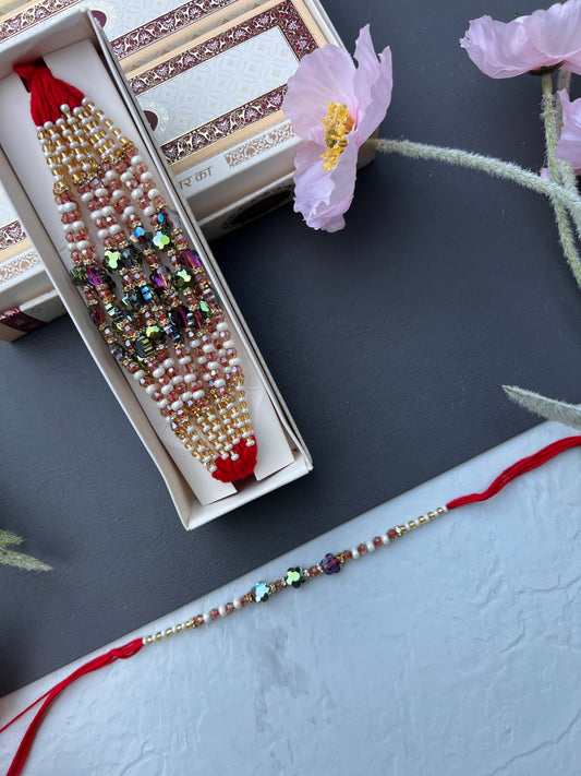 Crystal & Pearl Loaded Rakhi /
Rakhdi Thread ( Per PC)