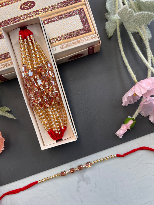 Crystal & Pearl Loaded Rakhi /
Rakhdi Thread ( Per PC)