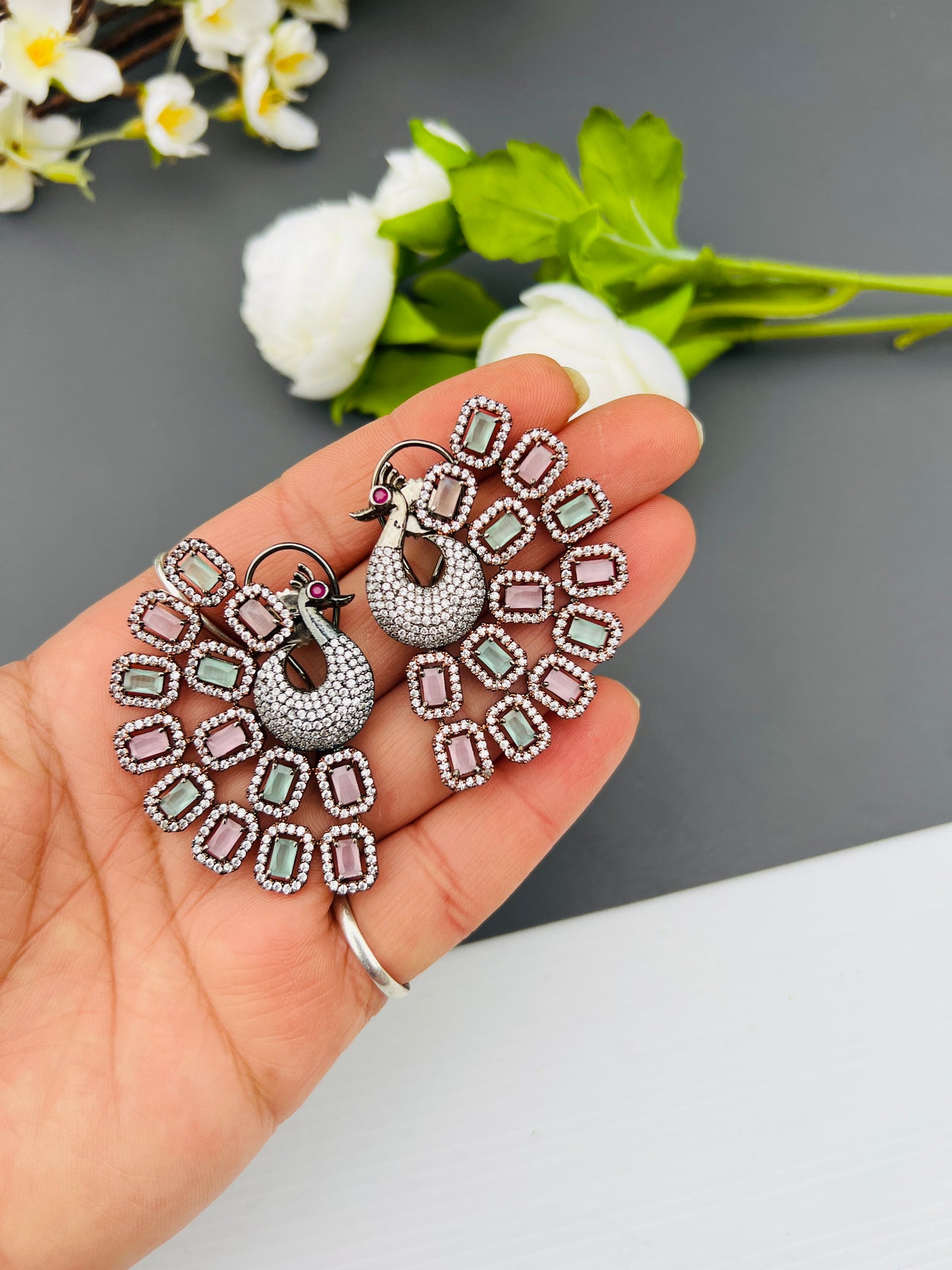 Peacock American diamond oversize studs