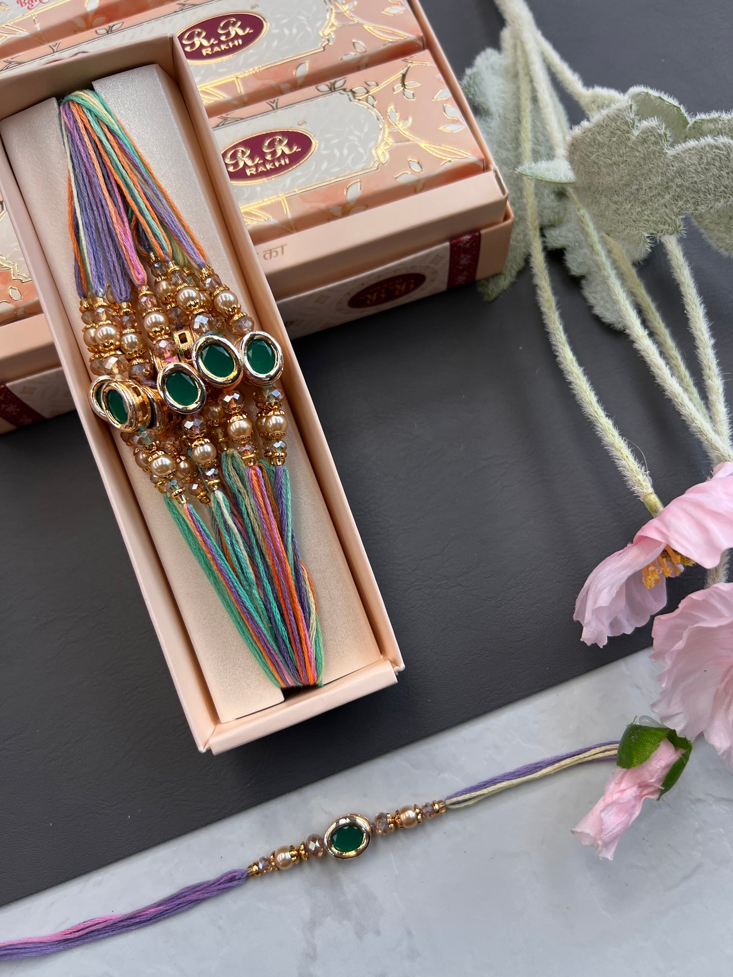 Kundan & Pearl Loaded Rakhi /
Rakhdi Thread ( Per PC)