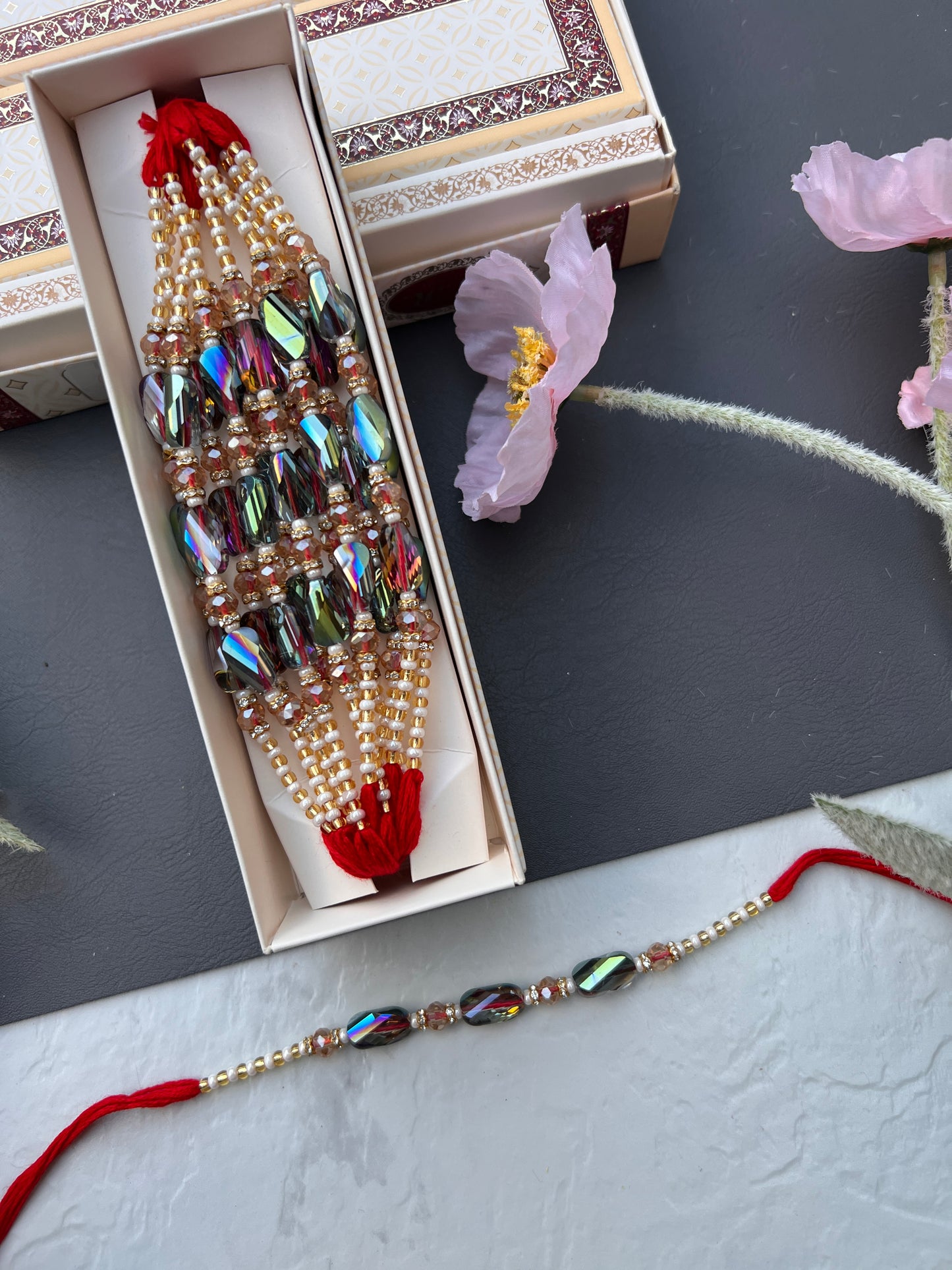 Crystal & Pearl Loaded Rakhi /
Rakhdi Thread ( Per PC)
