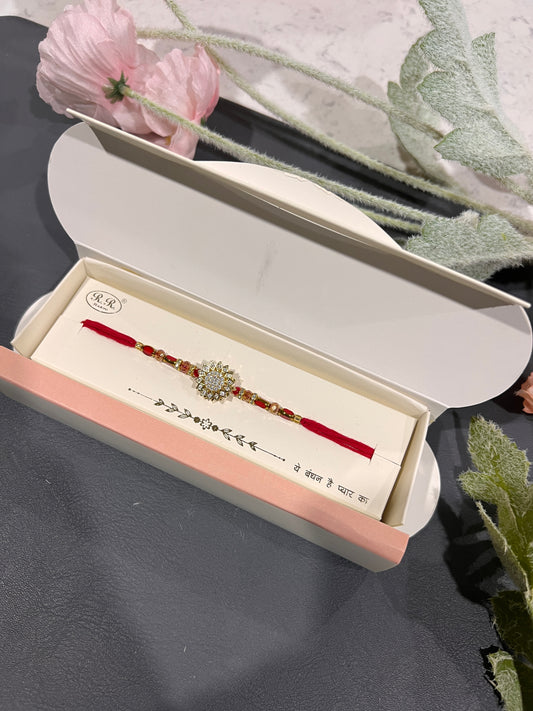 American diamond spinning Rakhi