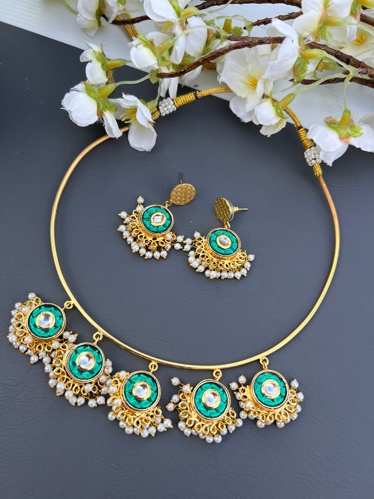 Regal Emerald Kundan Hasli Necklace Set