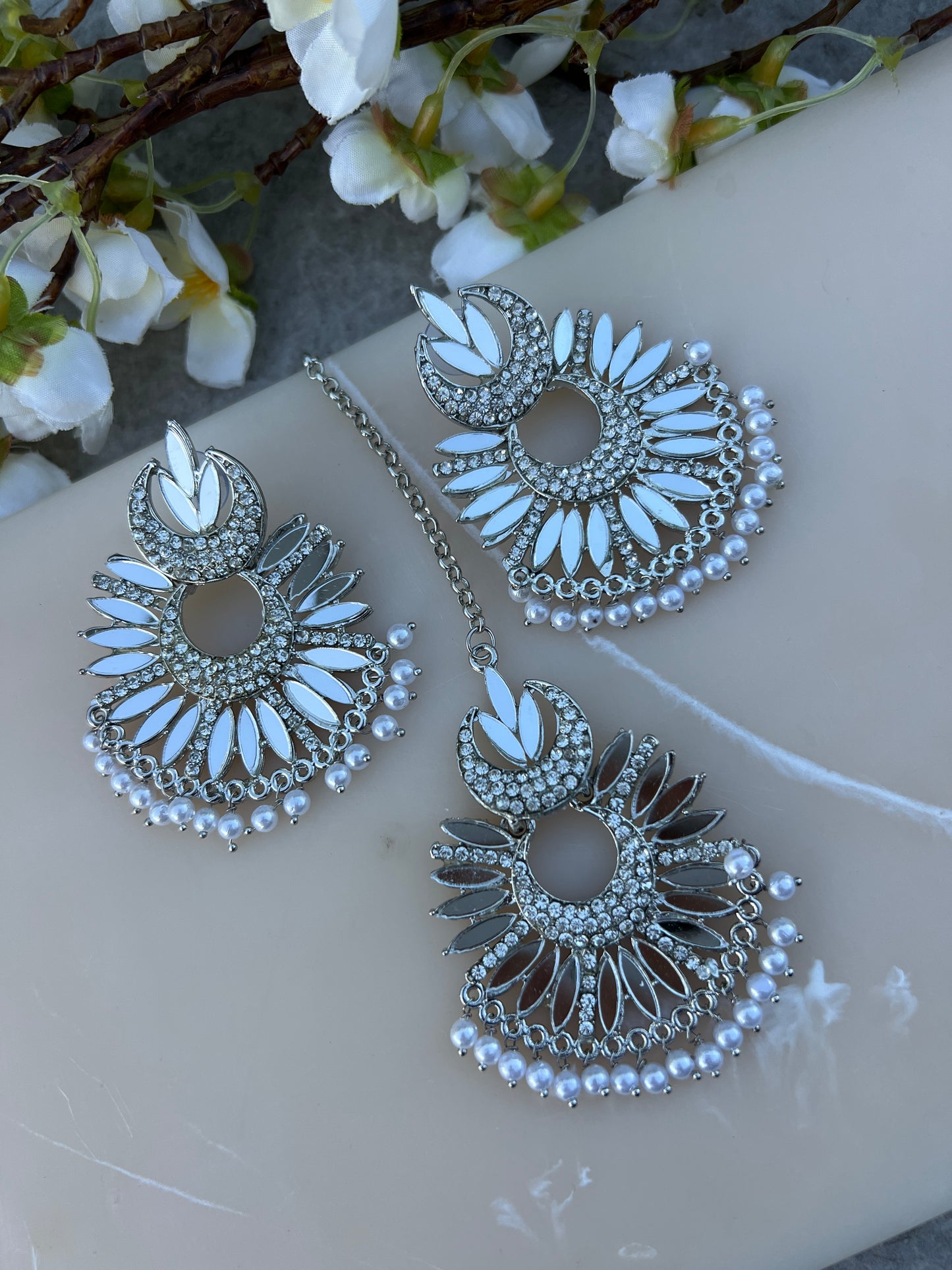 Silver earrings and tikka set