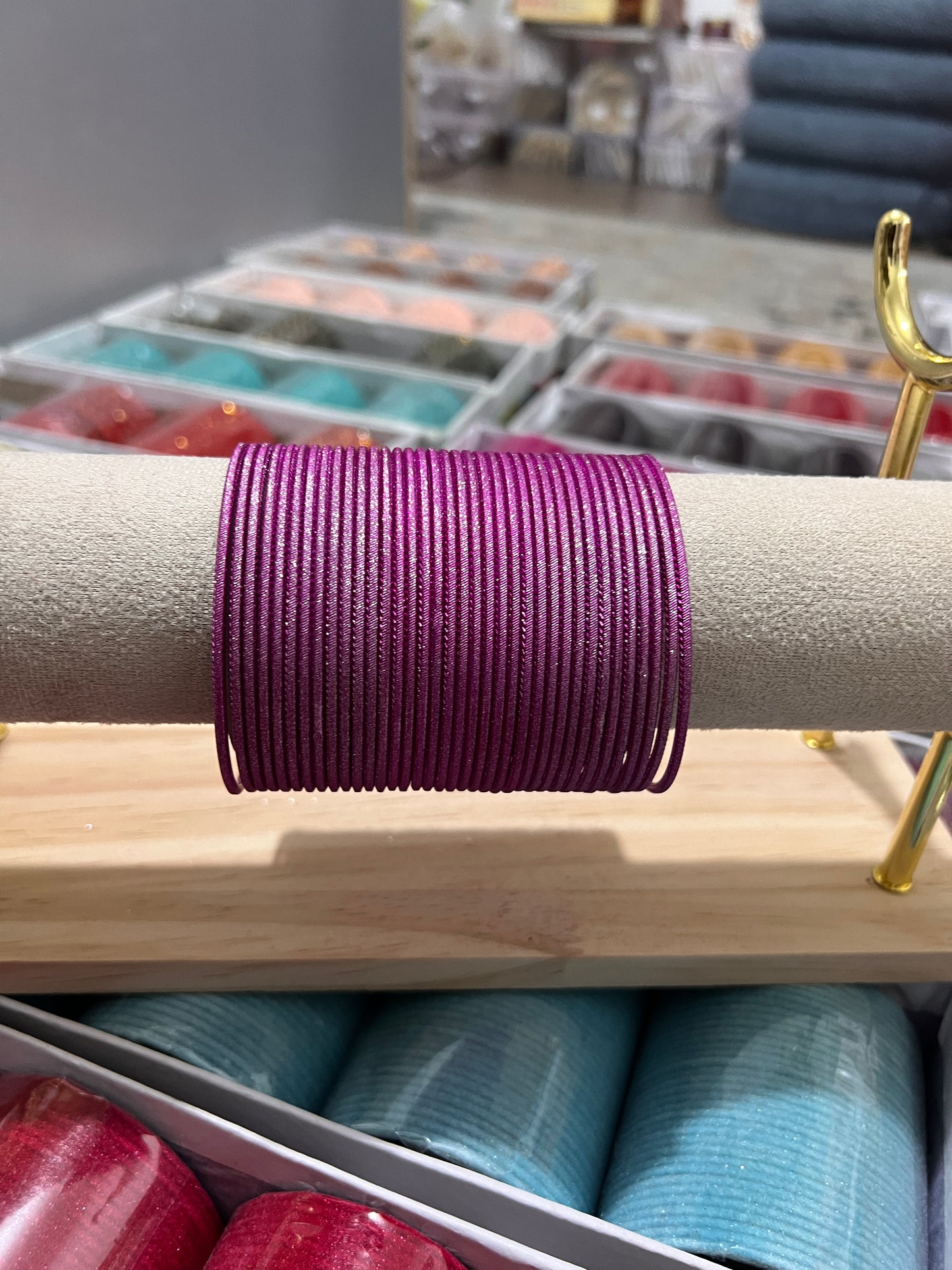 Shimmery hot pink metal bangles