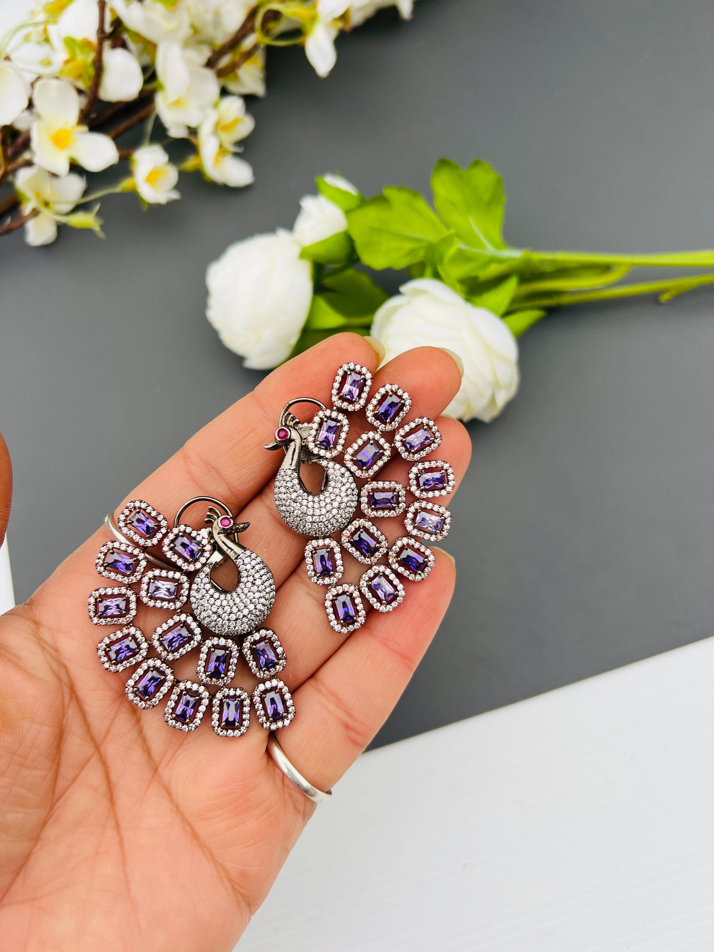 Peacock American diamond oversize studs