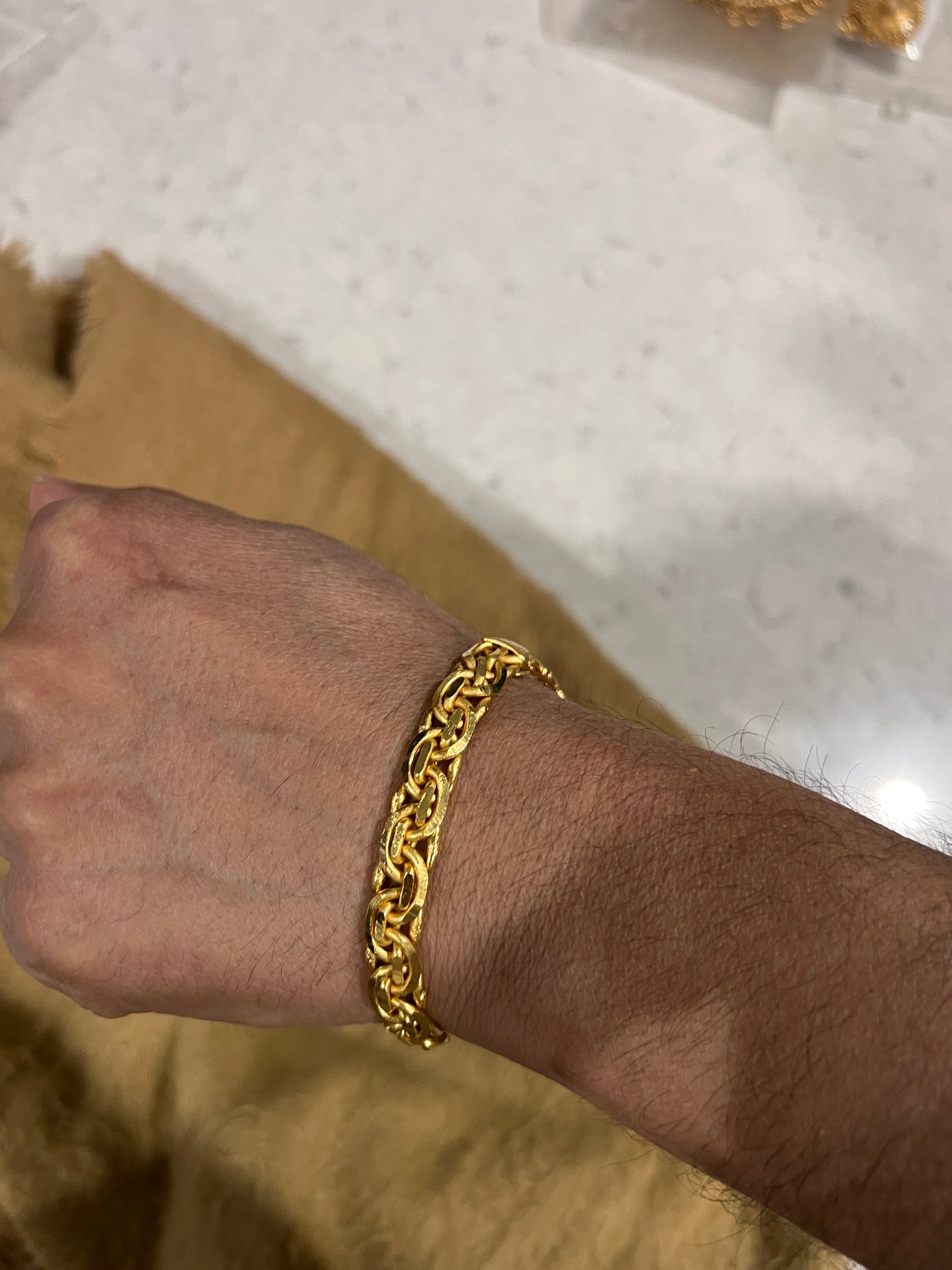 Gold plated bracket for brother