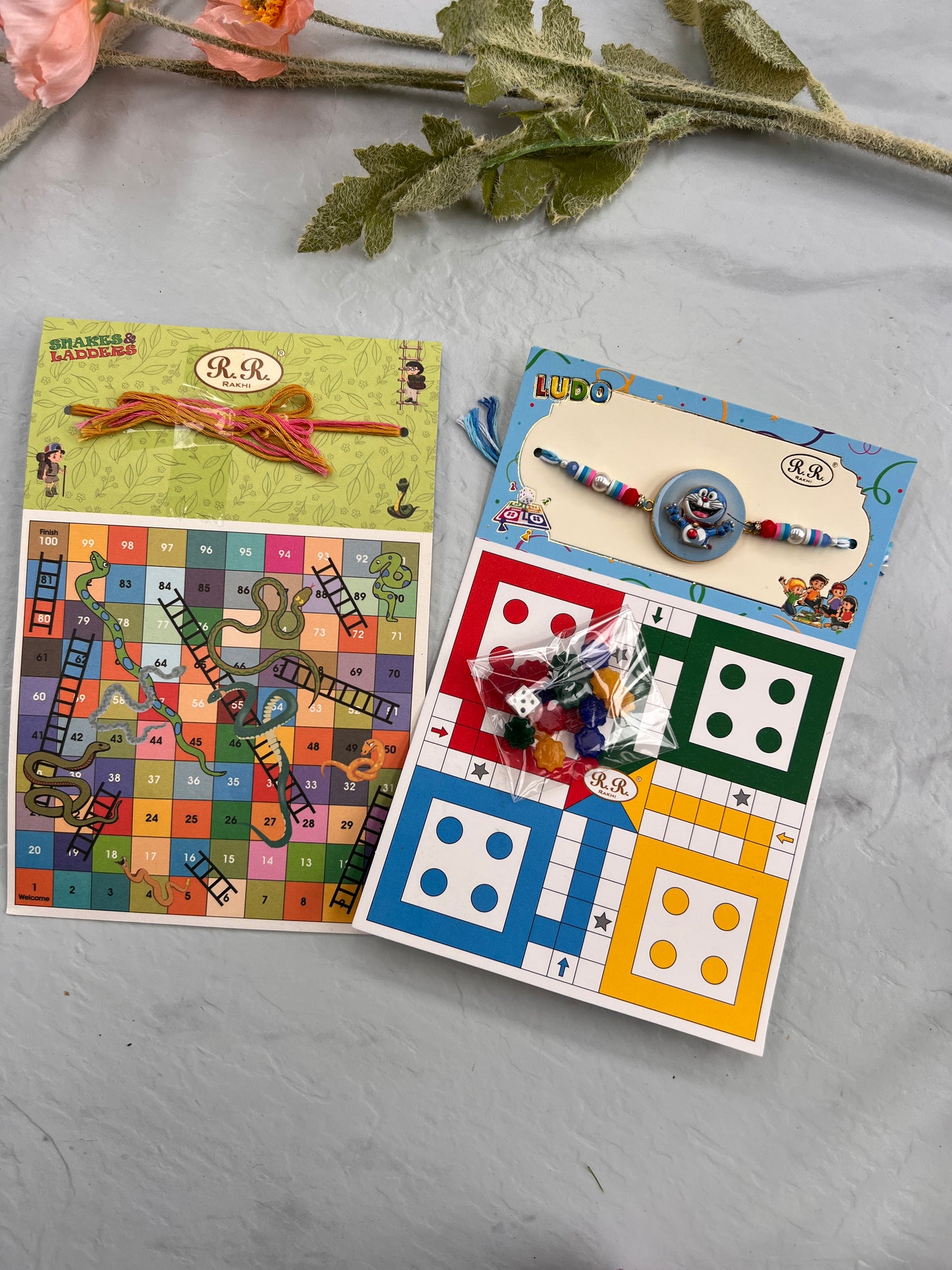 Doremon Game rakhi ( 2 games in one:
Ludo and snack ladder)
Spider man
