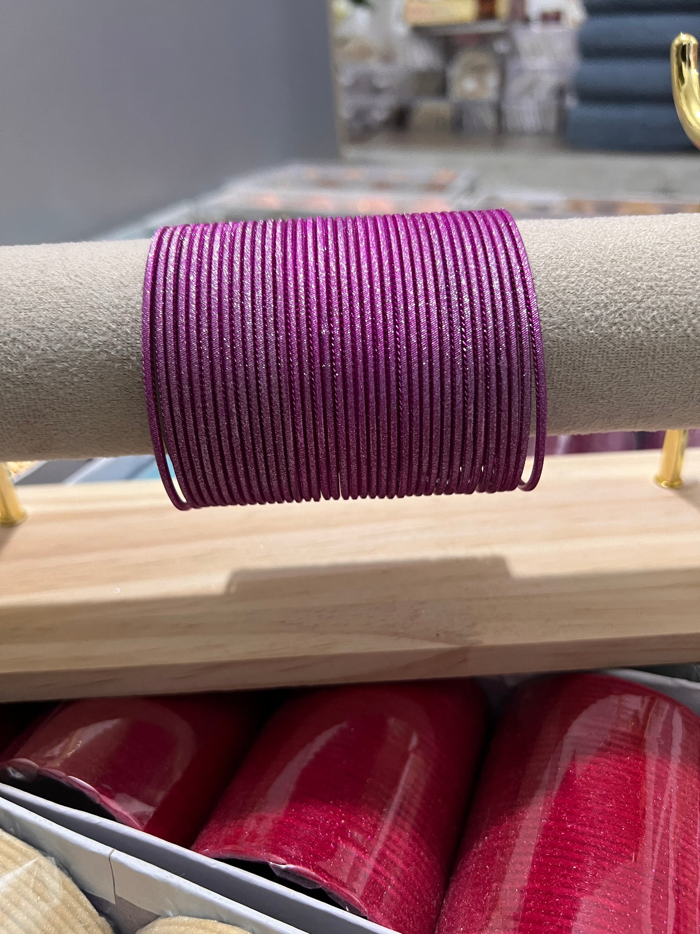 Shimmery hot pink metal bangles
