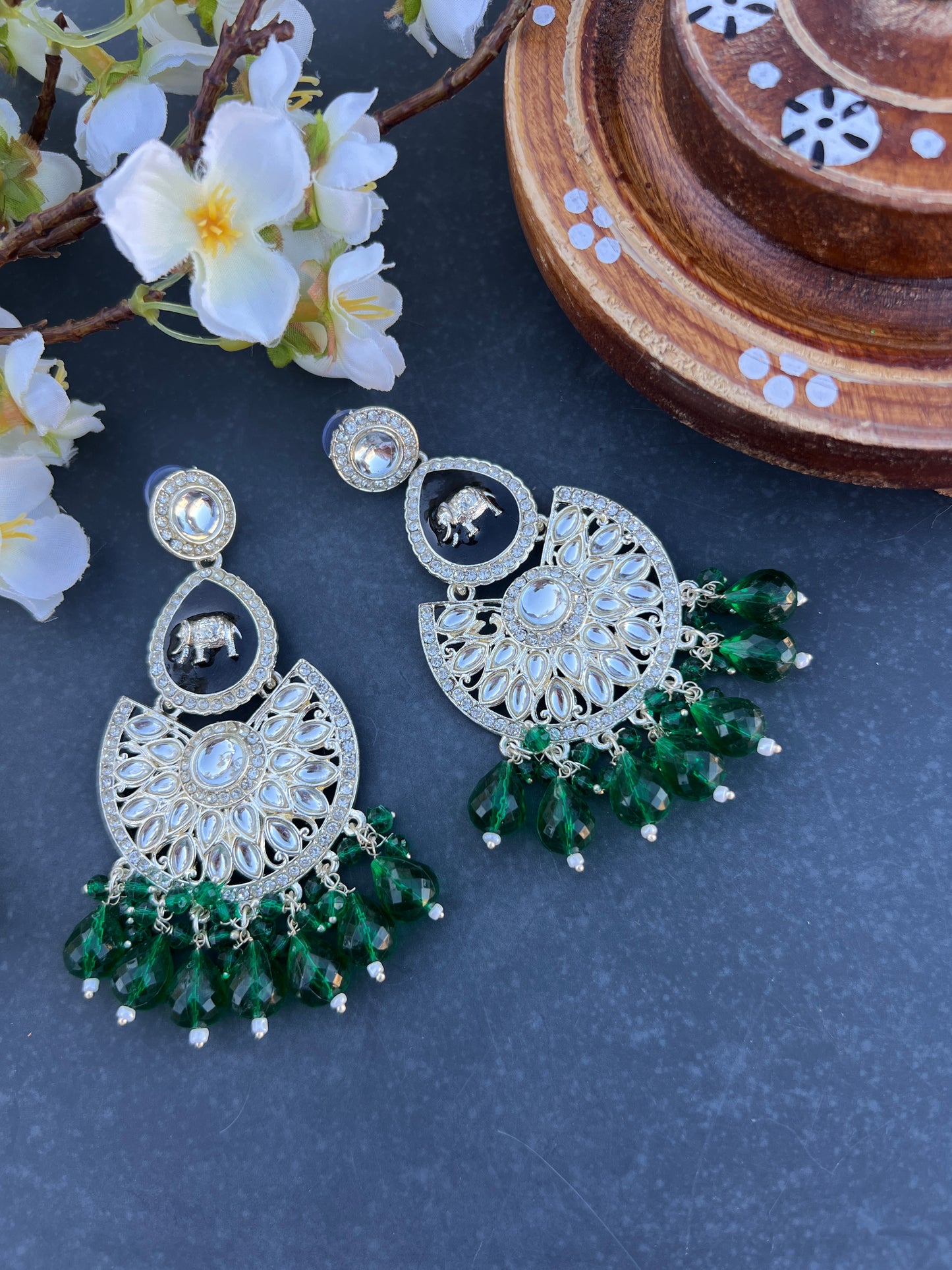 Green kundan earrings