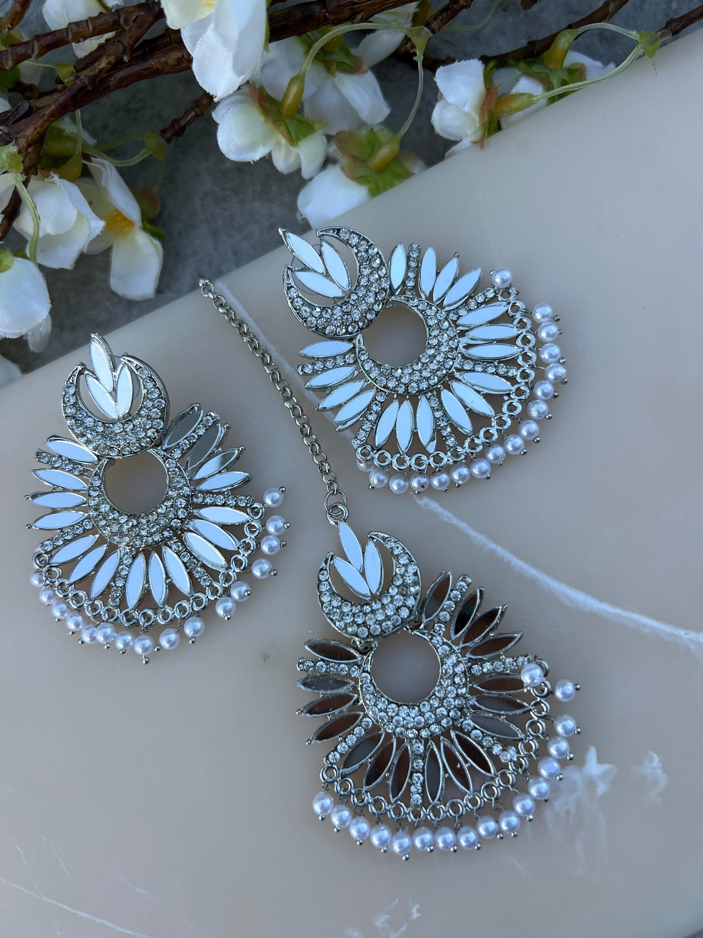 Silver earrings and tikka set