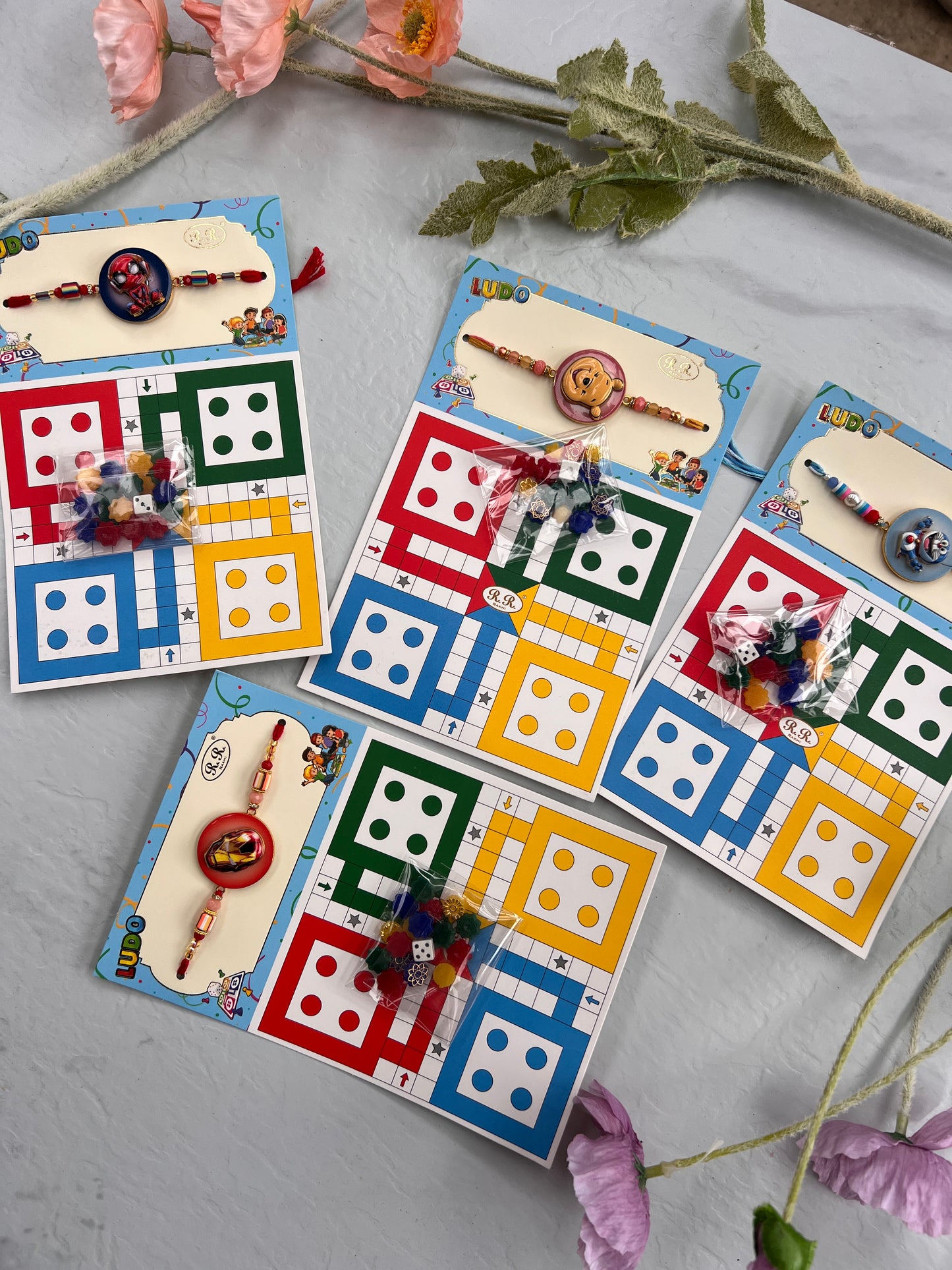 Doremon Game rakhi ( 2 games in one:
Ludo and snack ladder)
Spider man
