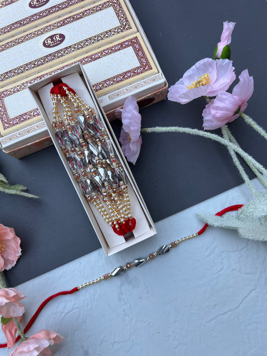 Crystal & Pearl Loaded Rakhi /
Rakhdi Thread ( Per PC)