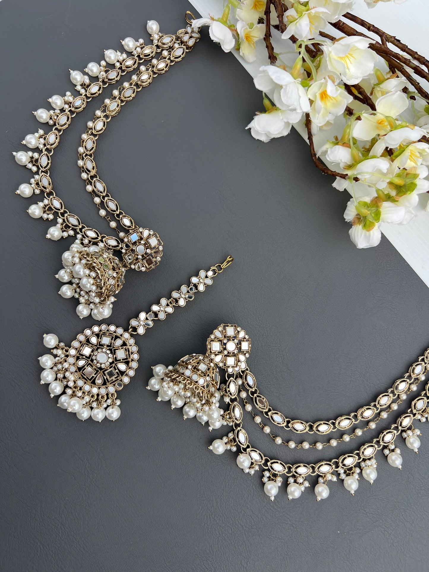 Sameera jhumka earrings with ear chains