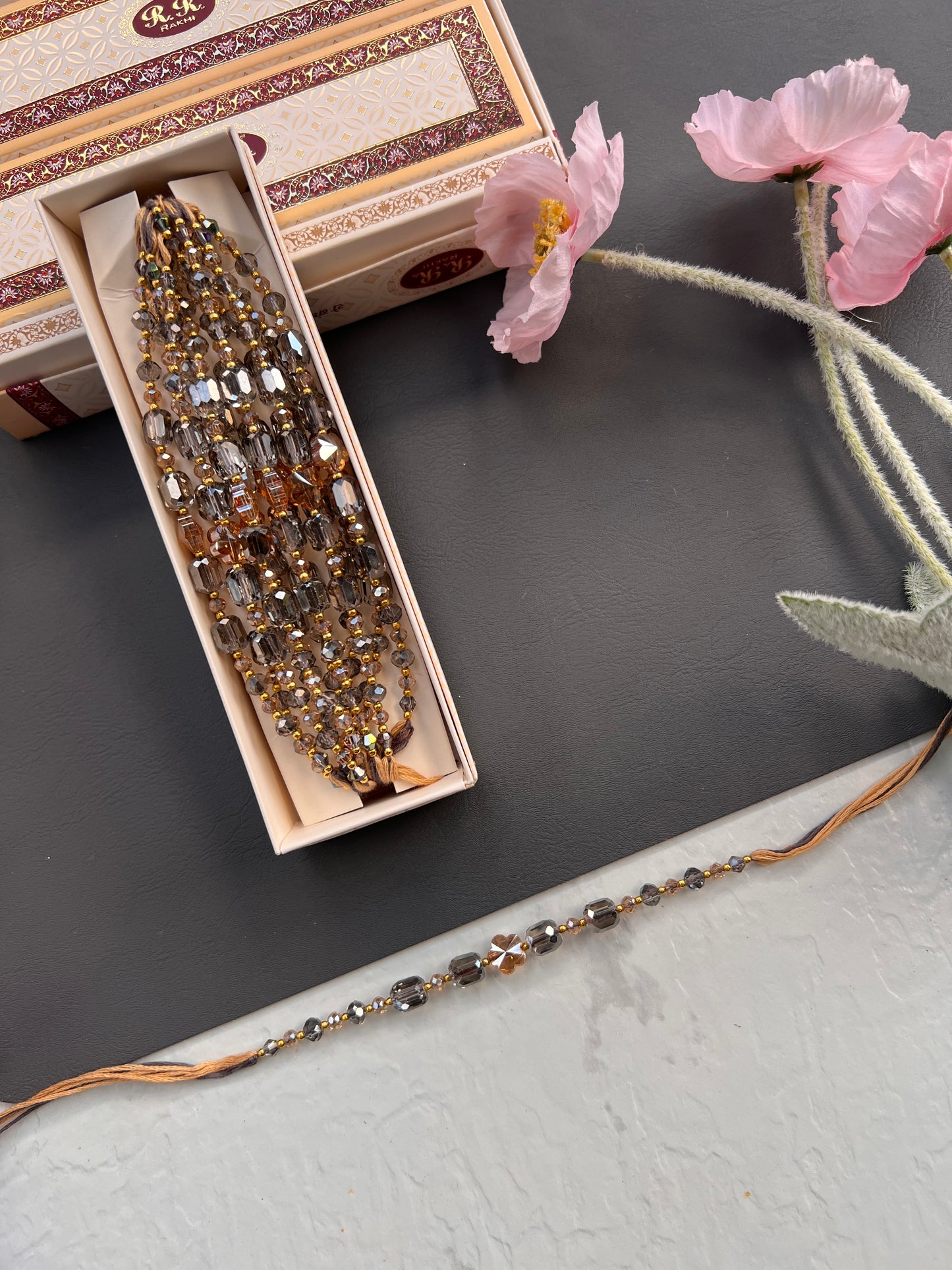 Crystal & Pearl Loaded Rakhi /
Rakhdi Thread ( Per PC)