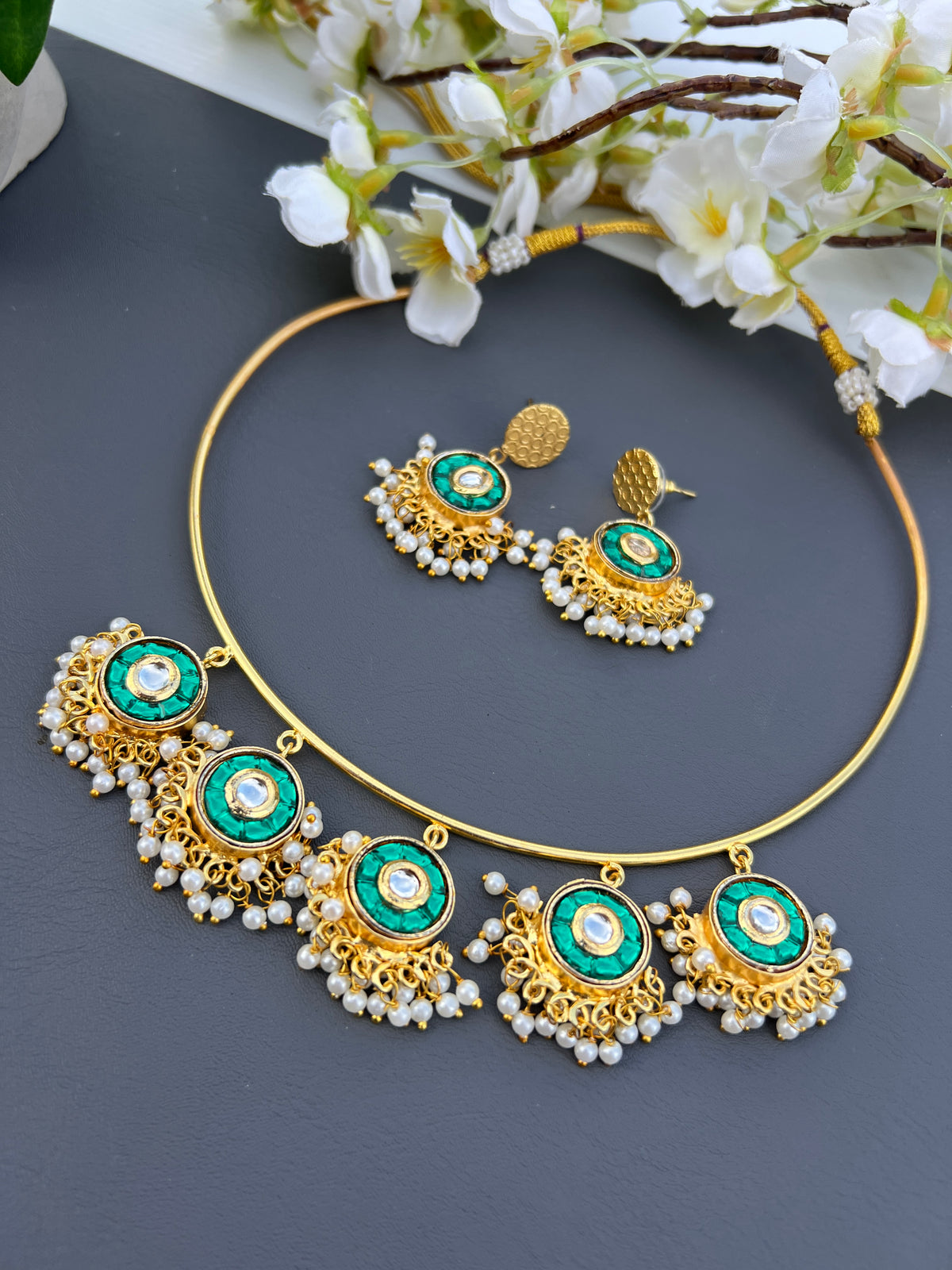 Regal Emerald Kundan Hasli Necklace Set
